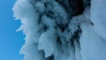 Stalactite icicles, close-up. On the arch of the stone grotto there are bizarre ice formations Royalty Free Stock Photo