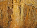 Yellow and red Stalactite and Stalagmite Formations in the Cave Royalty Free Stock Photo