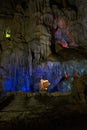 Stalactite and stalagmite formations in a limestone cave of Halong Bay Royalty Free Stock Photo