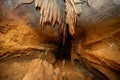 Stalactite and stalagmite and other formations inside a beautiful cave. Royalty Free Stock Photo