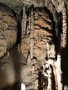 Stalactite and stalagmite of Postojna Cave. Royalty Free Stock Photo