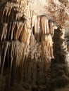 Stalactite and stalagmite of Postojna Cave. Royalty Free Stock Photo