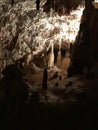 Stalactite and stalagmite of Postojna Cave. Royalty Free Stock Photo