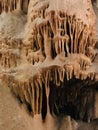 Stalactite and stalagmite of Postojna Cave. Royalty Free Stock Photo