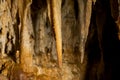Stalactites And Stalagmites Inside Natural Limestone Cave. Natural Formations