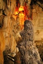 Stalagmites and stalactites inside the cave, decorated with light yellow line is beautiful at Tham Chang Cave ,Vang Vieng,Laos Royalty Free Stock Photo