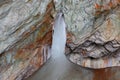 Stalagmites and stalactites inside the underground glacier in Scarisoara glacier cave. Royalty Free Stock Photo