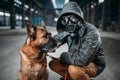 Stalker and dog, survivors in danger zone Royalty Free Stock Photo