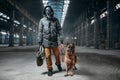 Stalker in gas mask and pet, survivors Royalty Free Stock Photo