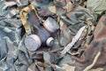 Stalker soldiers soviet gas mask lies with knife on green khaki camouflage jackets