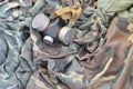 Stalker soldiers soviet gas mask lies on many green khaki camouflage jackets