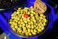 Stall with Greek olives at street market in Athens, Greece