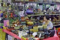 Stall holders selling gardening supplies such as pots