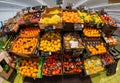 Stall selling fruit with colorful citrus fruits in italian supermarket