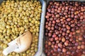 Stall with Tsakistes and Amfissa olives at street market Royalty Free Stock Photo