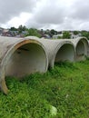 Stalled urban drainage culverts, overgrown with weeds