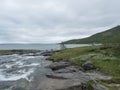 Staloluokta, Norrbotten, Sweden, Agust 11, 2021: Blue Fiskeflyg helicopter with tourist and supplies landing at sami