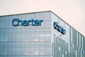 Corporate Headquarters of Spectrum Cable parent company Charter Communications offices and logo in Connecticut at sunset Royalty Free Stock Photo