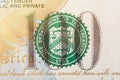 Stamp of the Department of The Treasury on hundred us dollar bill closeup macro Royalty Free Stock Photo