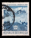 Stamp issued in the Austria shows Berg Isel ski-jump with view on the northern mountain range