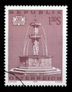 Stamp issued in the Austria shows  Fountain in Friesach Karnten, Art Treasures in Austria Royalty Free Stock Photo