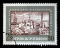 Stamp issued in the Austria shows Steam Power Plant Vienna, the 25th Anniversary of Nationalized Electricity