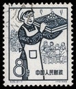 Stamp issued in the China shows dining, the 1st Anniversary of People`s Communes