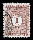 Stamp issued in Kingdom of Serbs, Croats and Slovenes shows numeric value Royalty Free Stock Photo