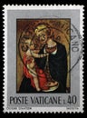 Stamp issued in Vatican shows Madonna of Humility 1433 by Stefano di Giovanni Sassetta, Pinacoteca Vaticana Royalty Free Stock Photo
