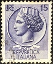 Stamp of the Italian Republic with an ancient Syracusan coin in the effigy