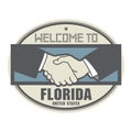 Business concept with handshake and the text Welcome to Florida, United States