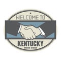 Business concept with handshake and the text Welcome to Kentucky