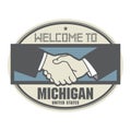 Business concept with handshake and the text Welcome to Michigan Royalty Free Stock Photo