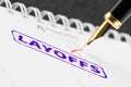 Stamp layoffs and pen close-up. Royalty Free Stock Photo