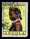 Stamp printed in the Angola shows Natives, Angolan Women