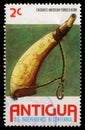 Stamp printed in Antigua shows Powder horn, Bicentenary of American Revolution