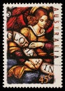 Stamp printed in Australia shows Angel with Gloria in excelsis Deo Banner Royalty Free Stock Photo