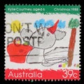 Stamp printed in the Australia shows Koala Wearing a Santa Hat, by Kylie Courtney