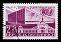 Stamp printed by Austria dedicated to 50 years of the Vienna Fair, shows First and Latest Exhibition Halls