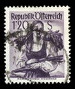 Stamp printed in Austria shows image woman in national Austrian costumes, Lower Austria, Wienerwald