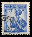 Stamp printed in Austria shows image woman in national Austrian costumes