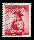 Stamp printed in Austria shows image woman in national Austrian costumes, Wilten