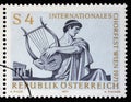 Stamp printed in the Austria shows Singer with Lyre, International Choir Festival, Vienna