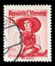 Stamp printed in Austria, shows a woman in national dress, Tirol, Pustertal Royalty Free Stock Photo