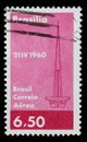 Stamp printed in Brazil with image of Brasilia abstract symbol to commemorate the founding of Brazil`s capital