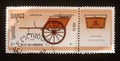 Stamp printed in Cambodia shows Rural post office cart, `Stamp World London 90` International Stamp Exhibition