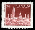 Stamp printed in Canada shows a Parliament Library in Ottawa, Ontario Royalty Free Stock Photo