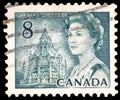 A stamp printed in Canada shows Royal families, Queen Elizabeth II, Wilding Portrait serie