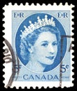 A stamp printed in Canada shows Royal families, Queen Elizabeth II, Wilding Portrait serie, circa 1954