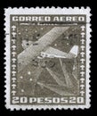 Stamp printed in Chile shows stylized Dornier Wal flying boat and compass